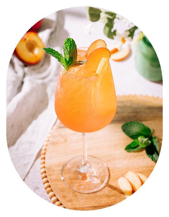 The Summer Peach Spritz - Garnishes and Dreams
